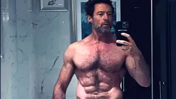 Hugh Jackman Turns Up the Heat with Sexy New Pool Selfie